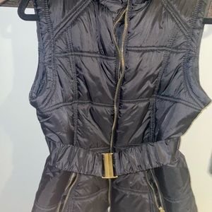 Black puffer coat with gold colour trim